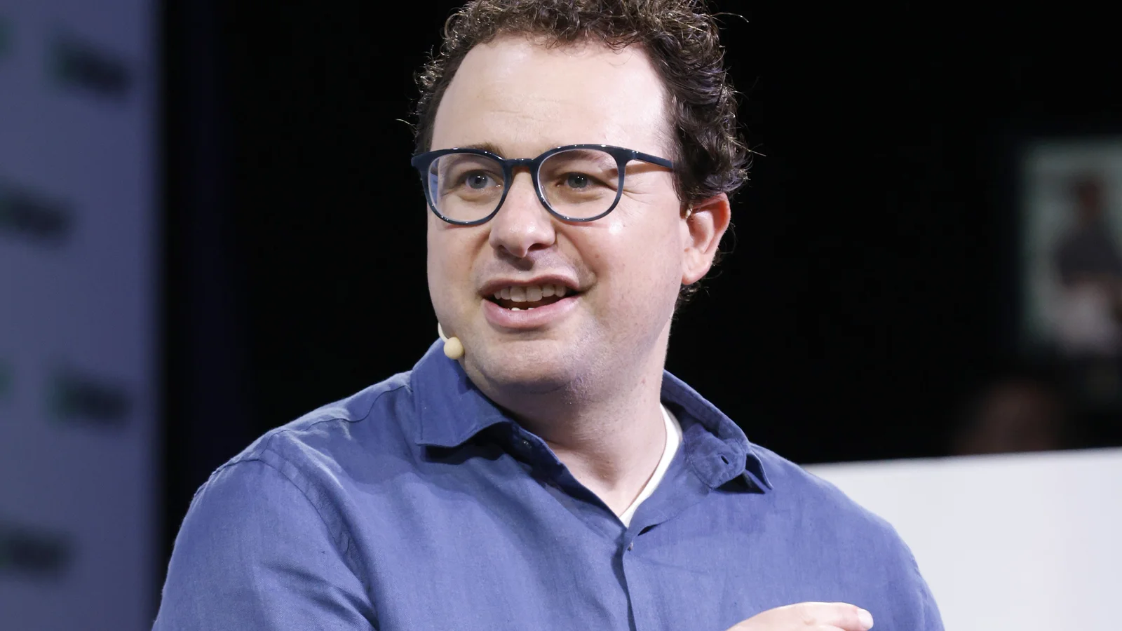 Anthropic CEO Dario Amodei speaking onstage at TechCrunch Disrupt 2023.