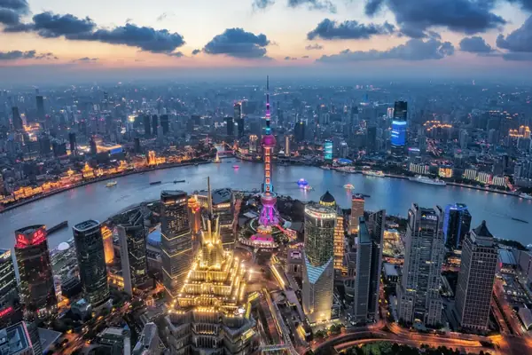 Shanghai at night, where Tim Cook confirmed the approval on October 15