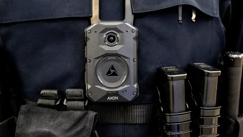 An officer wearing a body camera on duty
