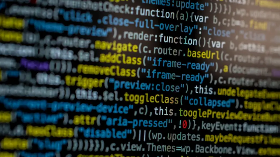 Developer workstation with code on a large monitor
