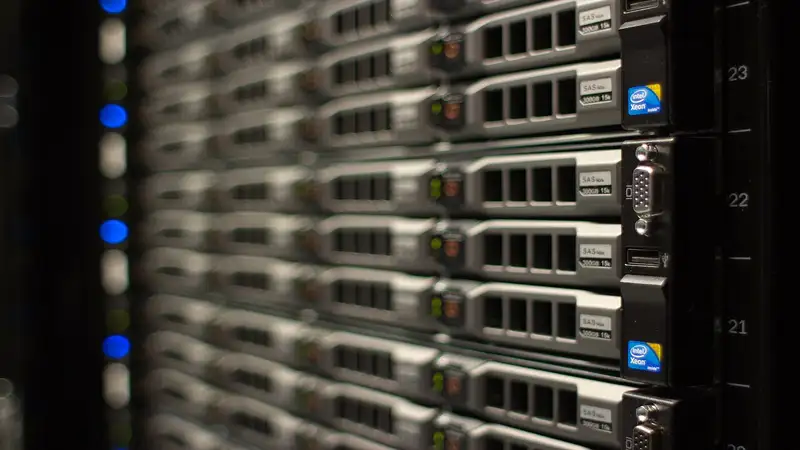 Rows of server racks inside a data centre.