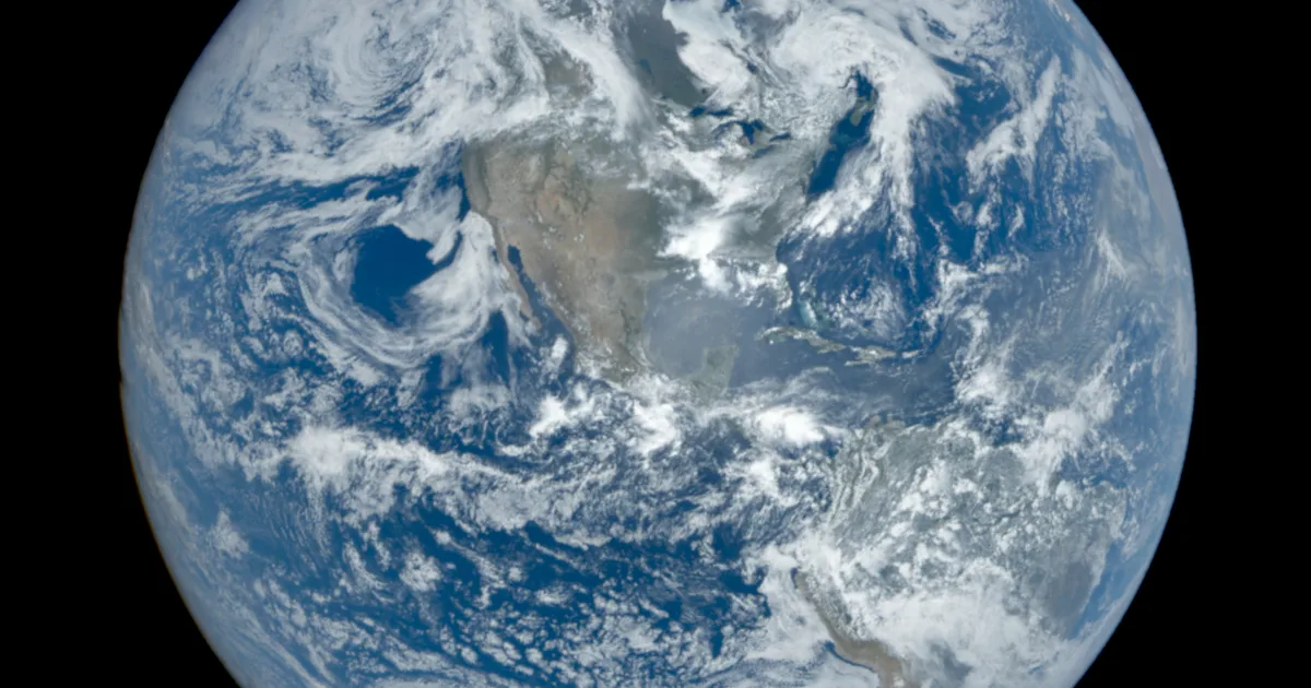 A photorealistic Earth globe seen from orbit, the real planet behind the live data layers of God's Eye View