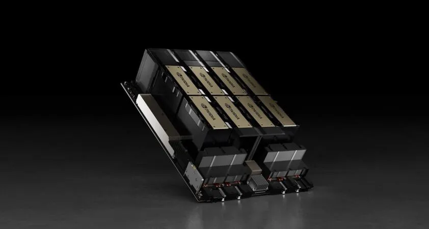 A close-up of an NVIDIA HGX GPU baseboard with eight accelerator modules