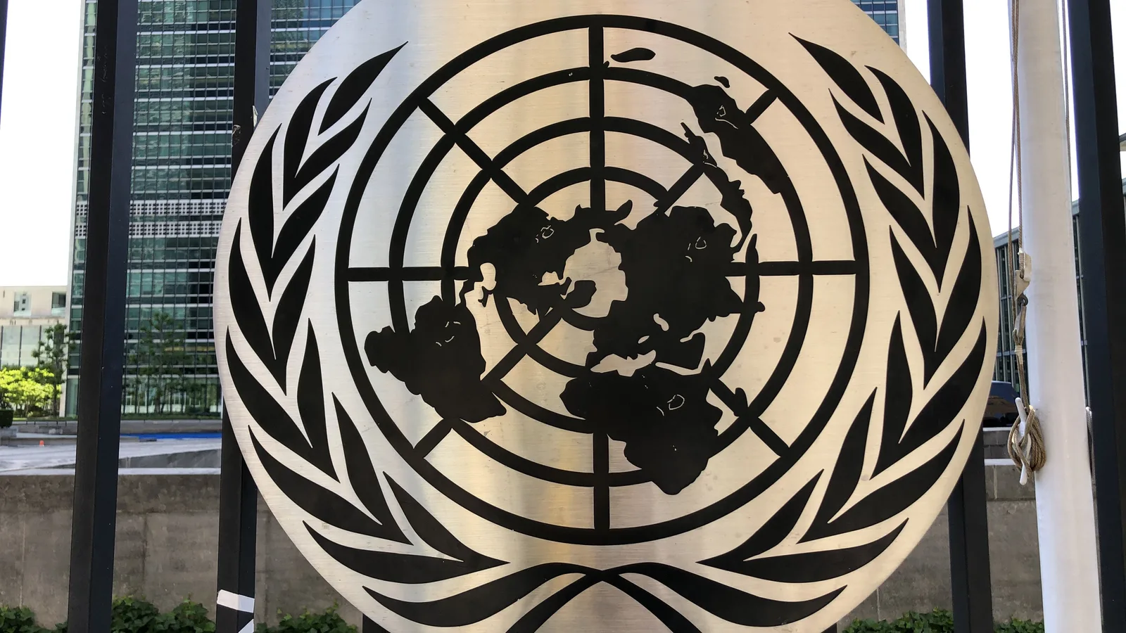 The United Nations emblem on a gate outside UN headquarters in New York