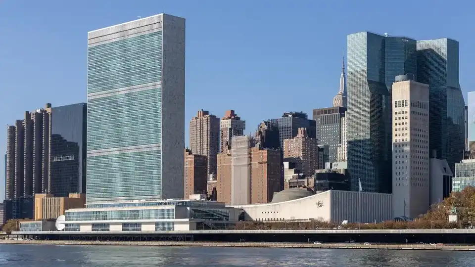 The UN Secretariat building and headquarters complex seen from across the East River