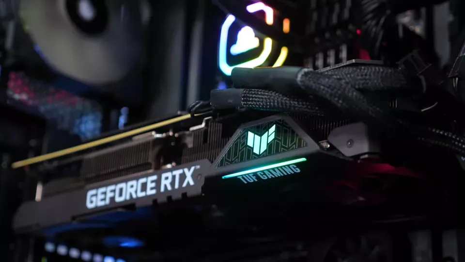 An ASUS TUF Gaming GeForce RTX graphics card mounted in a PC case, the 12GB-plus class of card PolyStrata uses to run Qwen3.8-Flash-Next