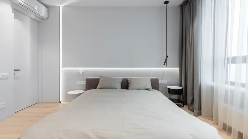 A cozy rental living room — Athena's routines flag anomalies like listings that are nearly fully booked but priced below their market