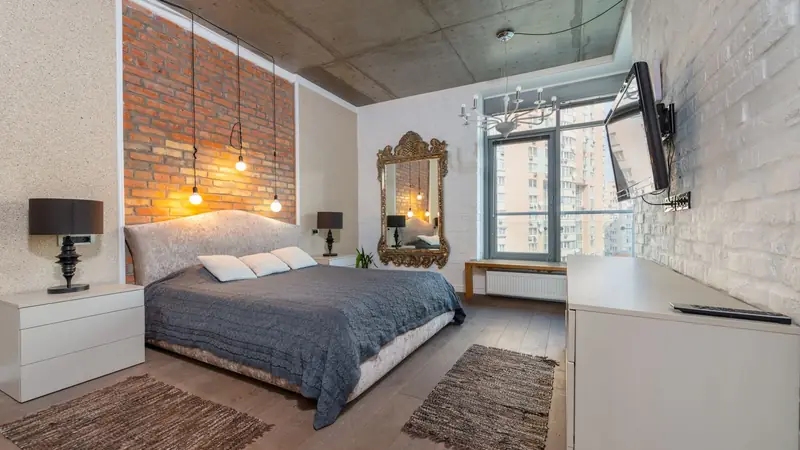 A rental bedroom ready for guests — Athena personalizes recommendations from each host's goals, listing notes, and past interactions