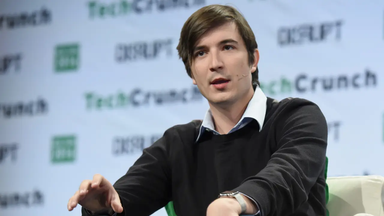 Robinhood CEO Vlad Tenev speaking onstage at TechCrunch Disrupt