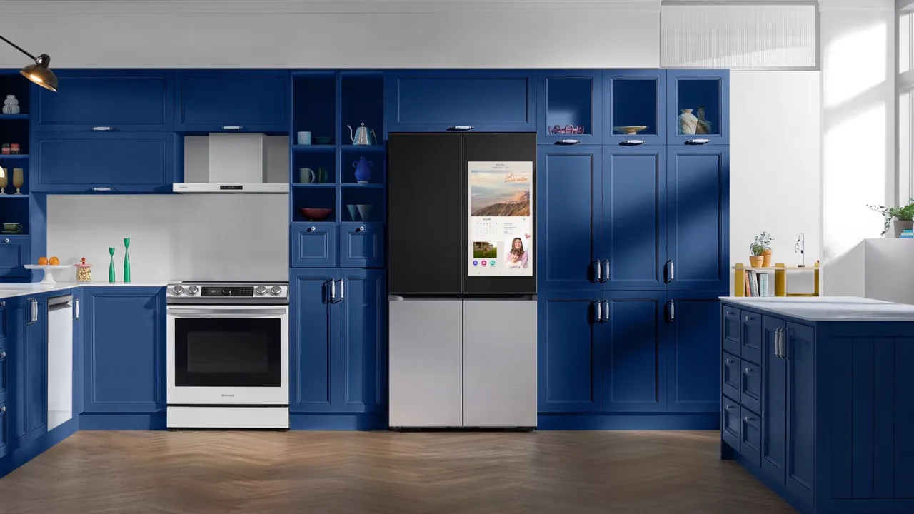 A Samsung Bespoke AI smart refrigerator with a Family Hub touchscreen in a modern kitchen.