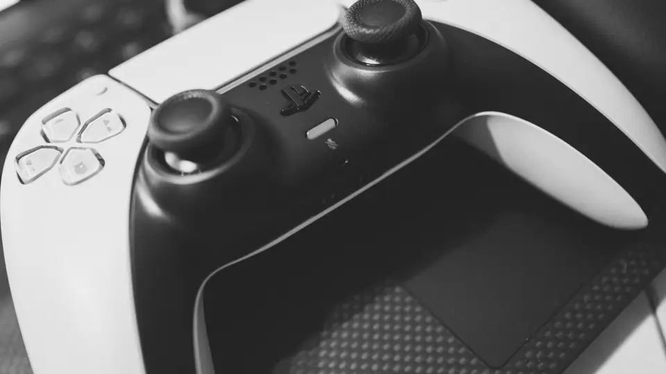 DualSense controller resting on a desk